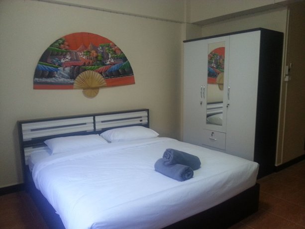 Imagen de la habitación del Hotel Oyo 963 Sunshine Guesthouse. Foto 4