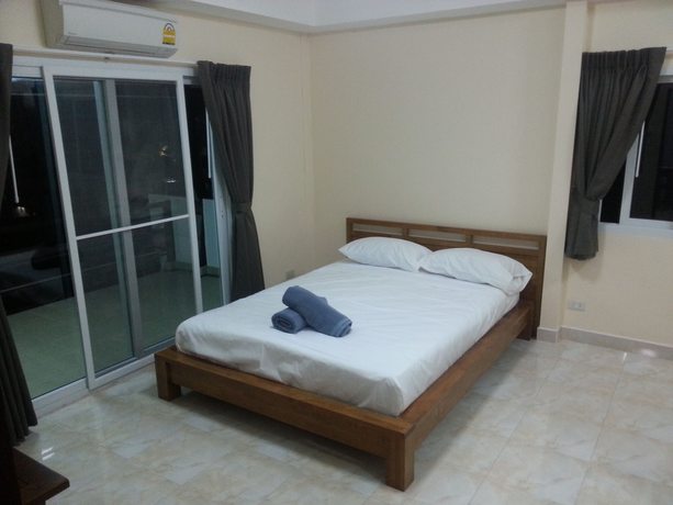 Imagen de la habitación del Hotel Oyo 963 Sunshine Guesthouse. Foto 6