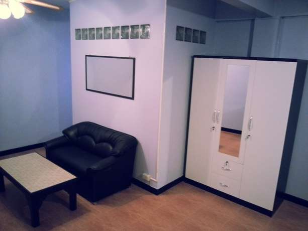 Imagen de la habitación del Hotel Oyo 963 Sunshine Guesthouse. Foto 7