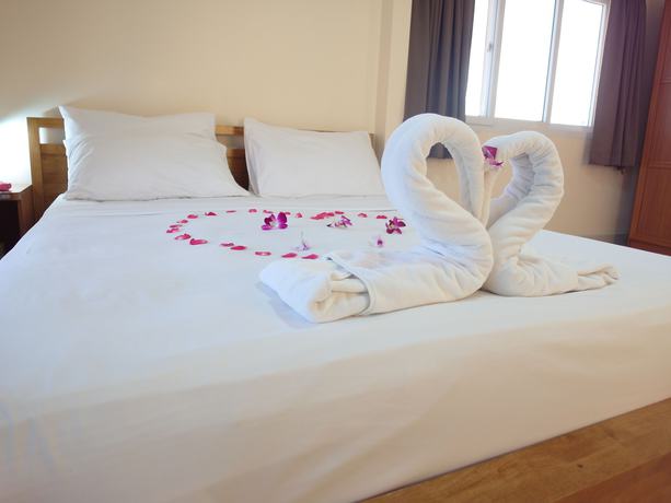 Imagen de la habitación del Hotel Oyo 963 Sunshine Guesthouse. Foto 11