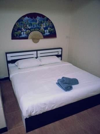 Imagen de la habitación del Hotel Oyo 963 Sunshine Guesthouse. Foto 14