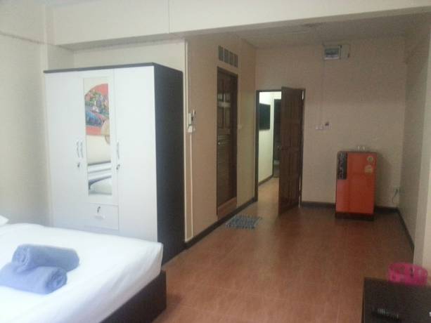 Imagen de la habitación del Hotel Oyo 963 Sunshine Guesthouse. Foto 19