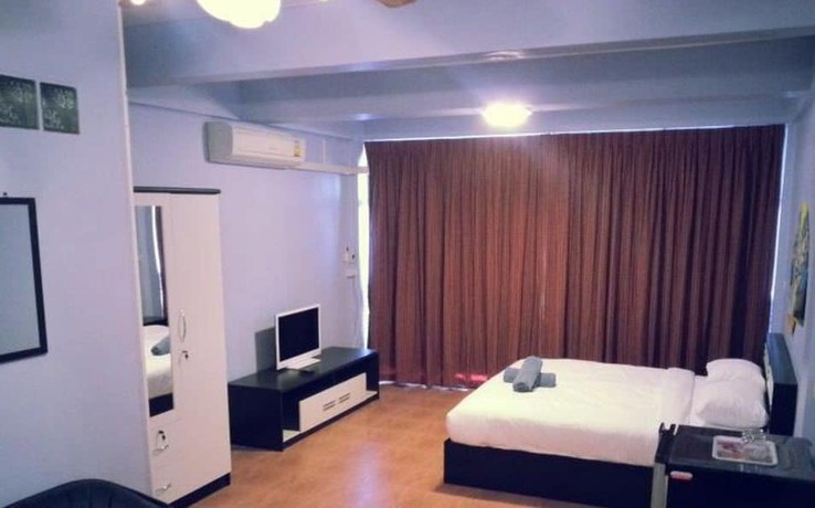 Imagen de la habitación del Hotel Oyo 963 Sunshine Guesthouse. Foto 20
