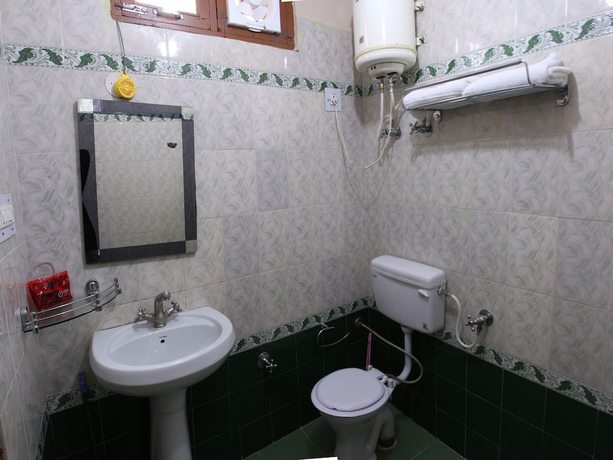 Imagen de la habitación del Hotel Oyo 9648 Morainic Hills. Foto 11