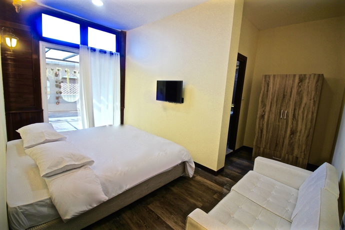 Imagen de la habitación del Hotel Oyo 965 Art Sanamchai. Foto 12