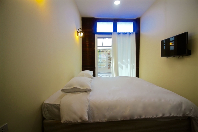 Imagen de la habitación del Hotel Oyo 965 Art Sanamchai. Foto 15