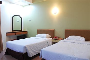 Imagen de la habitación del Hotel Oyo 979 Hua Kuok Inn. Foto 4