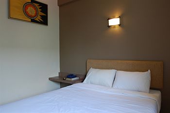 Imagen de los interiores del Hotel Oyo 979 Hua Kuok Inn. Foto 11