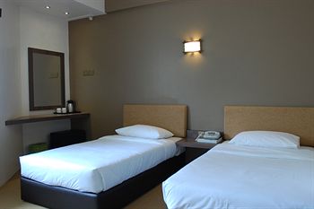 Imagen de la habitación del Hotel Oyo 979 Hua Kuok Inn. Foto 5