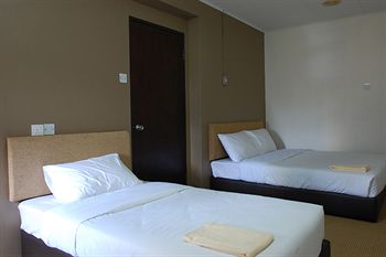 Imagen de la habitación del Hotel Oyo 979 Hua Kuok Inn. Foto 6