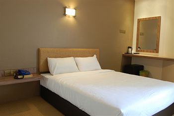 Imagen de la habitación del Hotel Oyo 979 Hua Kuok Inn. Foto 7