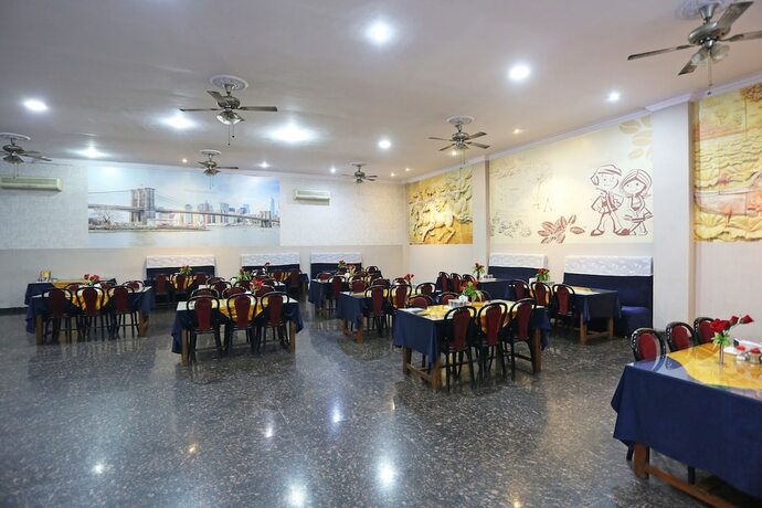 Imagen del bar/restaurante del Hotel Oyo 9856 Mp Inn. Foto 2