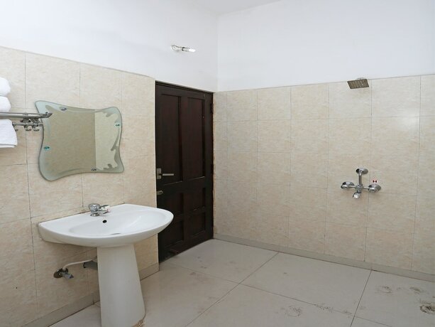 Imagen de la habitación del Hotel Oyo 9856 Mp Inn. Foto 4