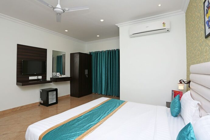 Imagen de la habitación del Hotel Oyo 9856 Mp Inn. Foto 8