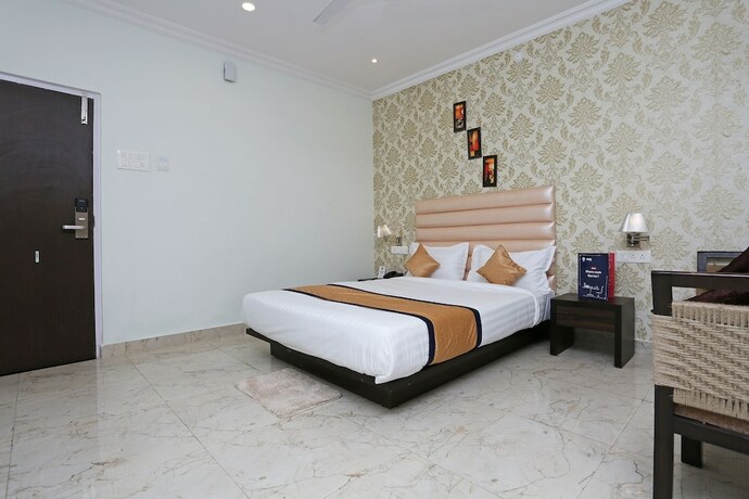 Imagen de la habitación del Hotel Oyo 9856 Mp Inn. Foto 10