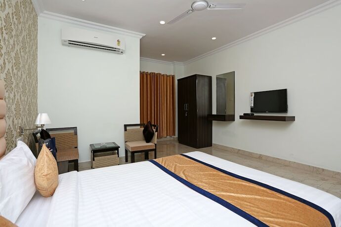 Imagen de la habitación del Hotel Oyo 9856 Mp Inn. Foto 11