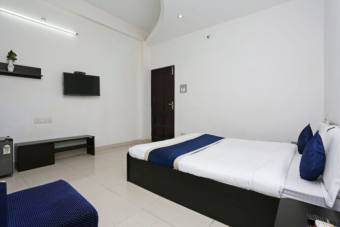 Imagen de la habitación del Hotel Oyo 9856 Mp Inn. Foto 13
