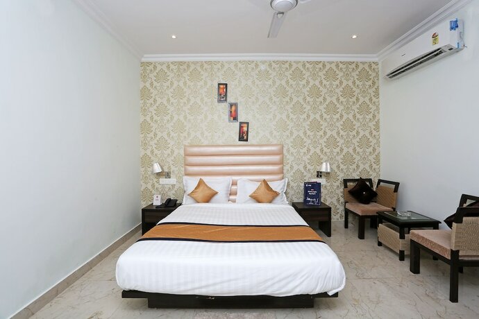 Imagen de la habitación del Hotel Oyo 9856 Mp Inn. Foto 16