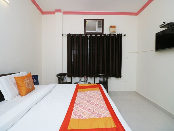 Imagen de la habitación del Hotel Oyo 9963 Raja Palace. Foto 7