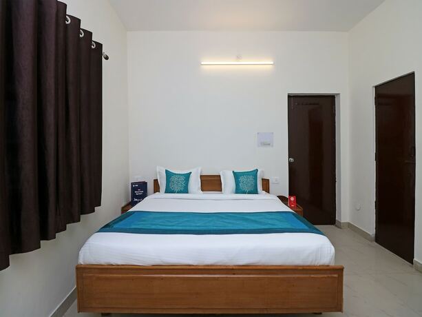 Imagen de la habitación del Hotel Oyo 9963 Raja Palace. Foto 12