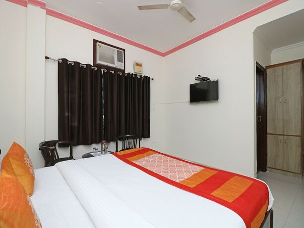 Imagen de la habitación del Hotel Oyo 9963 Raja Palace. Foto 15