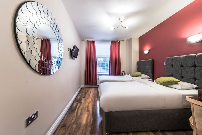 Imagen de la habitación del Hotel Oyo Baylis House. Foto 13