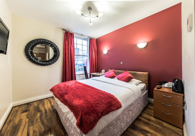 Imagen de la habitación del Hotel Oyo Baylis House. Foto 14