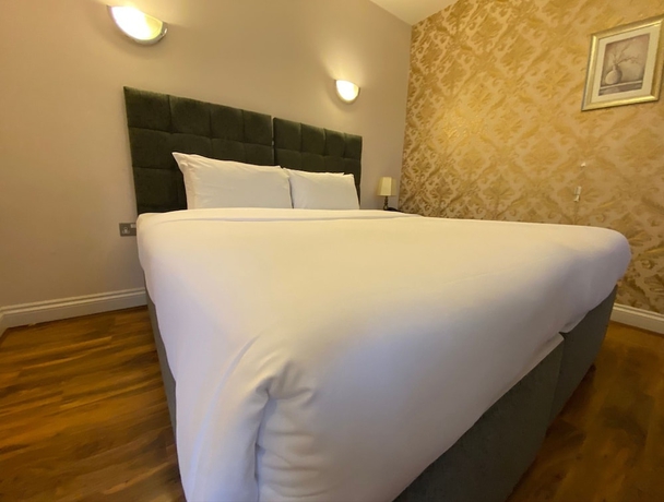 Imagen de la habitación del Hotel Oyo Baylis House. Foto 15