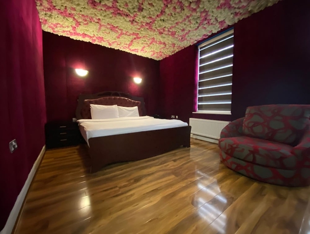 Imagen de la habitación del Hotel Oyo Baylis House. Foto 16