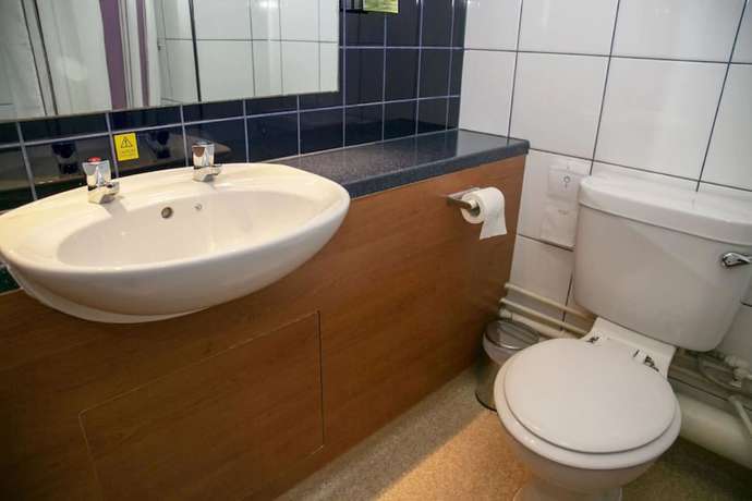 Imagen de la habitación del Hotel Oyo Bluemont. Foto 10