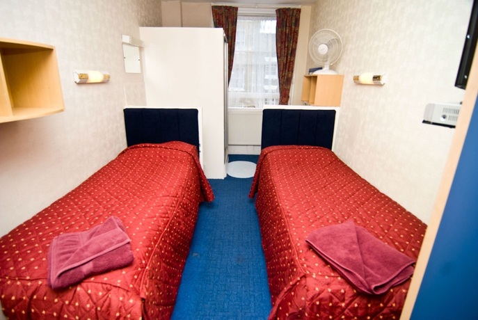 Imagen de la habitación del Hotel Oyo Boston Court. Foto 2