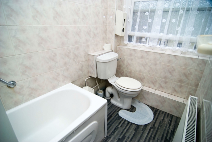 Imagen de la habitación del Hotel Oyo Boston Court. Foto 7