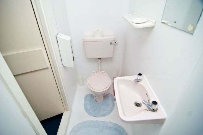 Imagen de la habitación del Hotel Oyo Boston Court. Foto 8