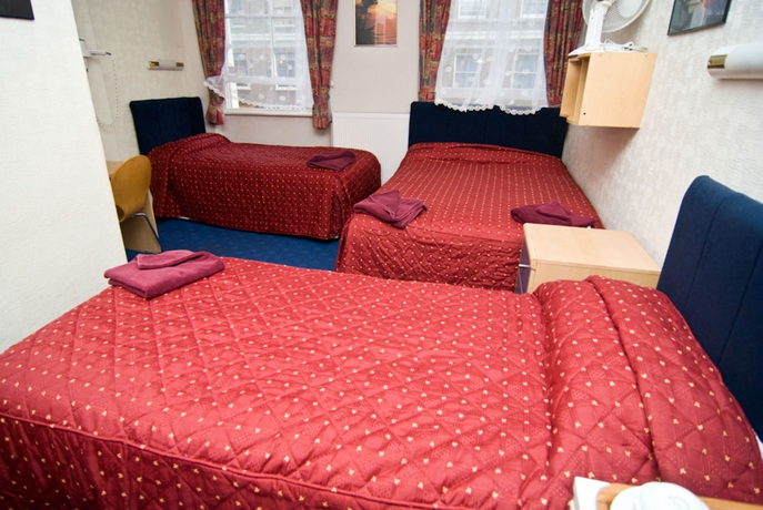 Imagen de la habitación del Hotel Oyo Boston Court. Foto 14