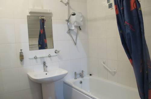 Imagen de la habitación del Hotel Oyo Bostons Manor. Foto 14