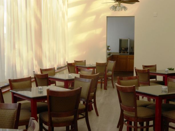 Imagen del bar/restaurante del Hotel Oyo Burlington South. Foto 2