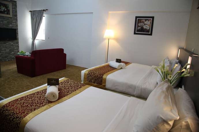 Imagen de la habitación del Hotel Oyo Capital O 89357 Unicorn. Foto 11