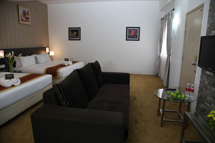 Imagen de la habitación del Hotel Oyo Capital O 89357 Unicorn. Foto 13