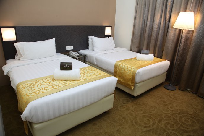 Imagen de la habitación del Hotel Oyo Capital O 89357 Unicorn. Foto 15