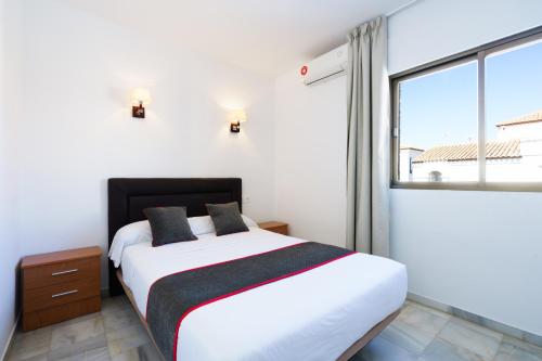 Imagen de la habitación del Hotel Oyo El Ancla. Foto 6