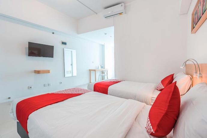 Imagen de la habitación del Hotel Oyo Flagship 1170 Apartemen The Habitat. Foto 11