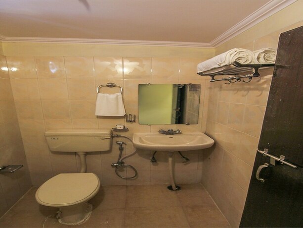 Imagen de la habitación del Hotel Oyo Flagship 118 Atithi Satkar Dashashwmedh. Foto 28