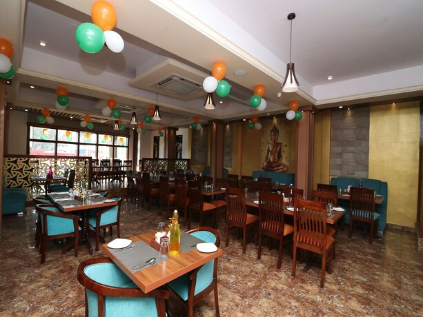 Imagen del bar/restaurante del Hotel Oyo Flagship 128 Aparajita. Foto 2