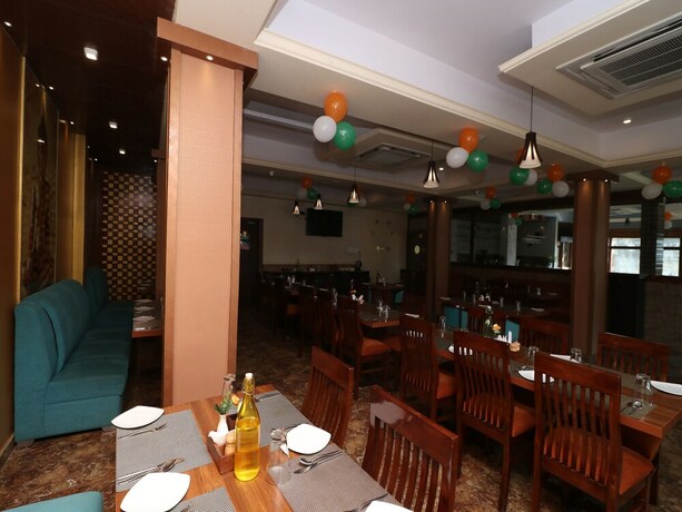Imagen del bar/restaurante del Hotel Oyo Flagship 128 Aparajita. Foto 3