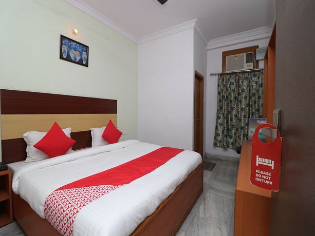 Imagen de la habitación del Hotel Oyo Flagship 128 Aparajita. Foto 10