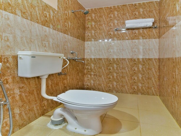 Imagen de la habitación del Hotel Oyo Flagship 12884 Neelratna Guest House. Foto 23