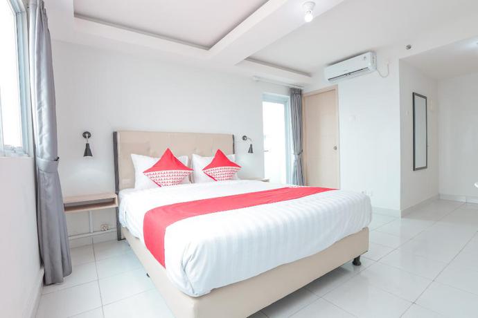 Imagen de la habitación del Hotel Oyo Flagship 210 Amethyst Kemayoran. Foto 2