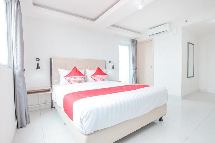 Imagen de la habitación del Hotel Oyo Flagship 210 Amethyst Kemayoran. Foto 4