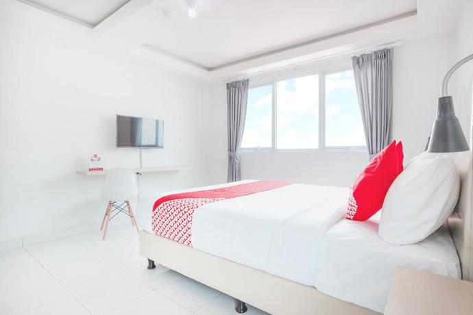 Imagen de la habitación del Hotel Oyo Flagship 210 Amethyst Kemayoran. Foto 5