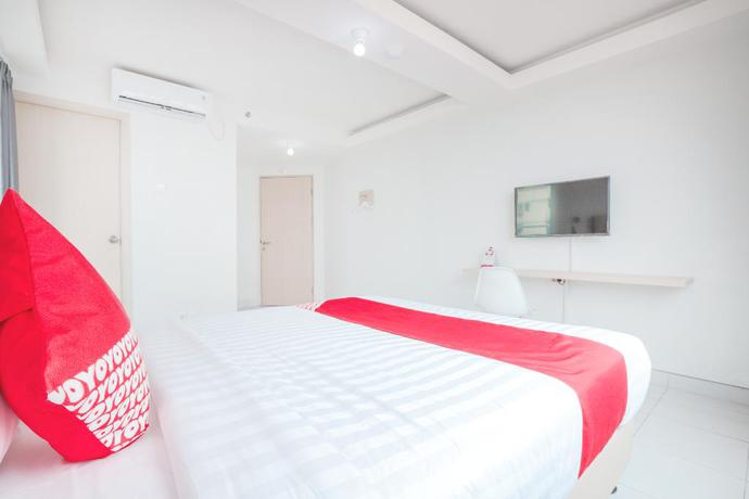 Imagen de la habitación del Hotel Oyo Flagship 210 Amethyst Kemayoran. Foto 6